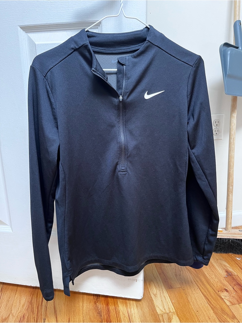 Nike Black Half-Zip Athletic Pullover with White Swoosh